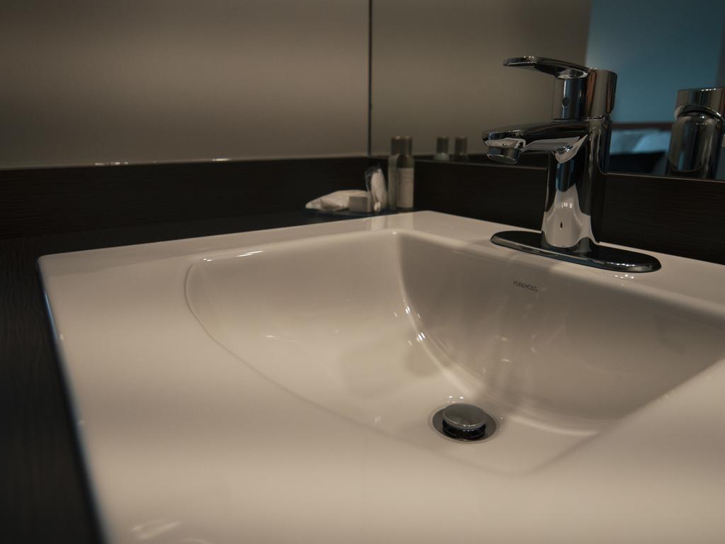 Hotel Le Voyageur Sept lles Bagian luar foto