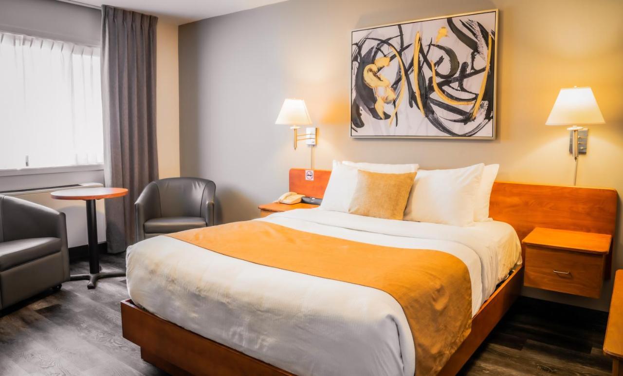 Hotel Le Voyageur Sept lles Bagian luar foto