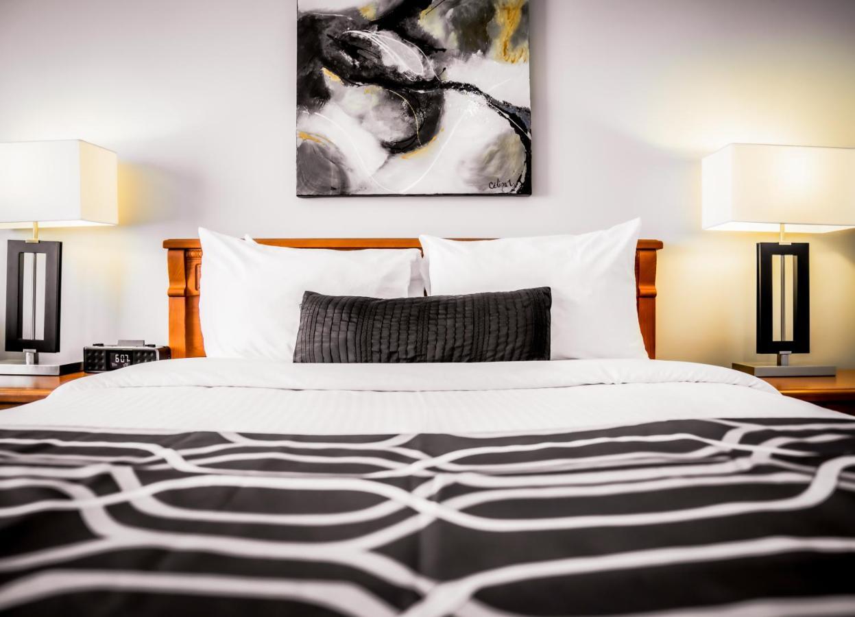 Hotel Le Voyageur Sept lles Bagian luar foto